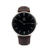 Kit 1: Reloj clásico negro - Color plata y correa café. Correa adicional negra de piel genuina, hebilla plateada